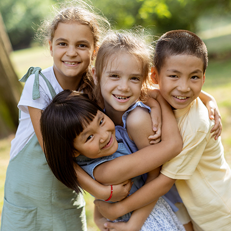 group of asian and caucasian kids having fun in th szezpj2.jpg